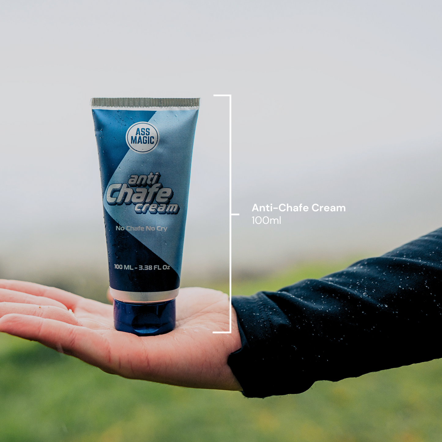 Close-up of a 100ml tube of ASS MAGIC anti-chafe cream resting on an athlete’s hand, ideal for preventing running chafe and promoting active skincare. Graphic highlighting the product's size and volume.